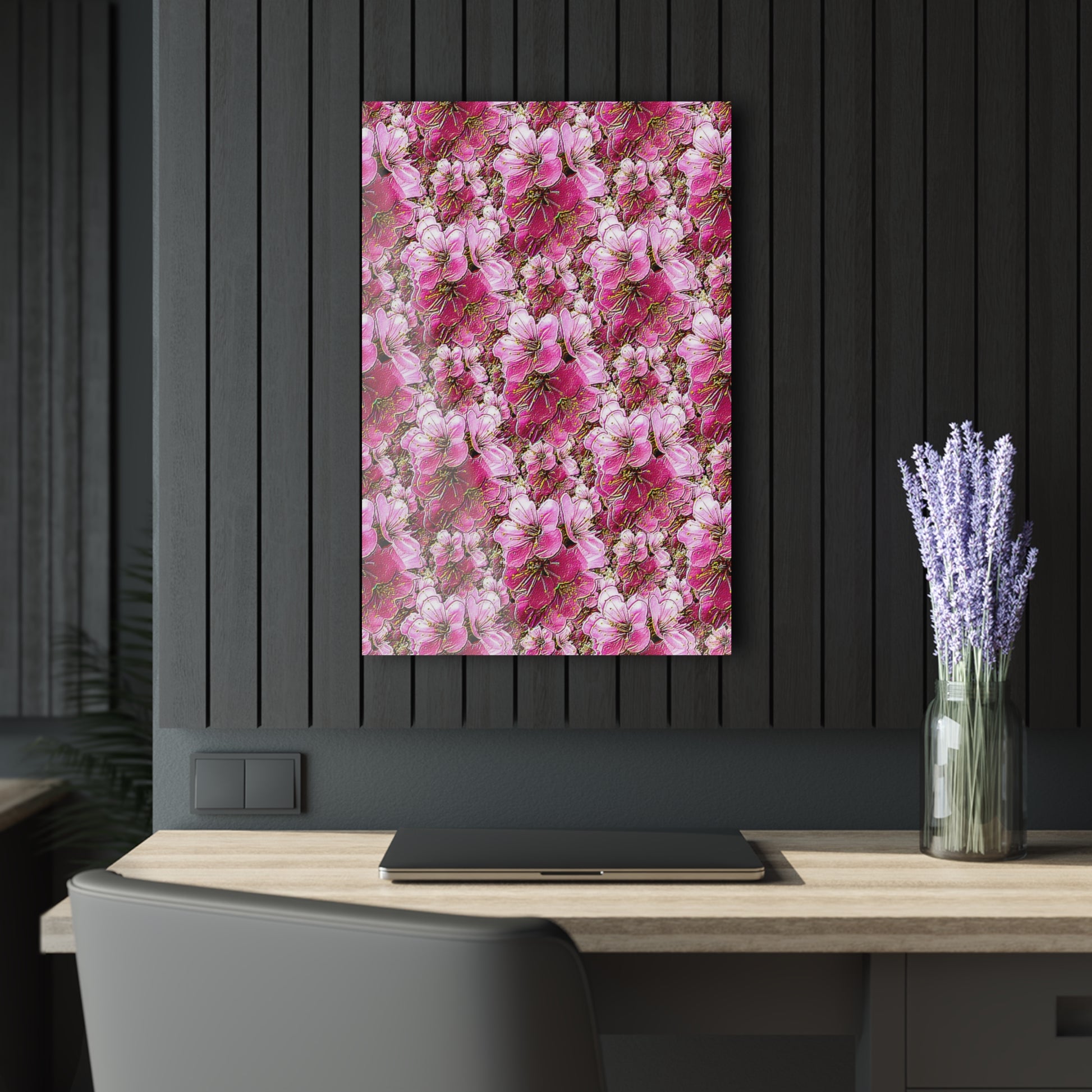Floral patterned poster on a black wall with a wooden desk and lavender plant.