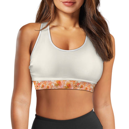 Apricot Bloom Essential sports bra with white trim and peach rose floral band on a cream base. 