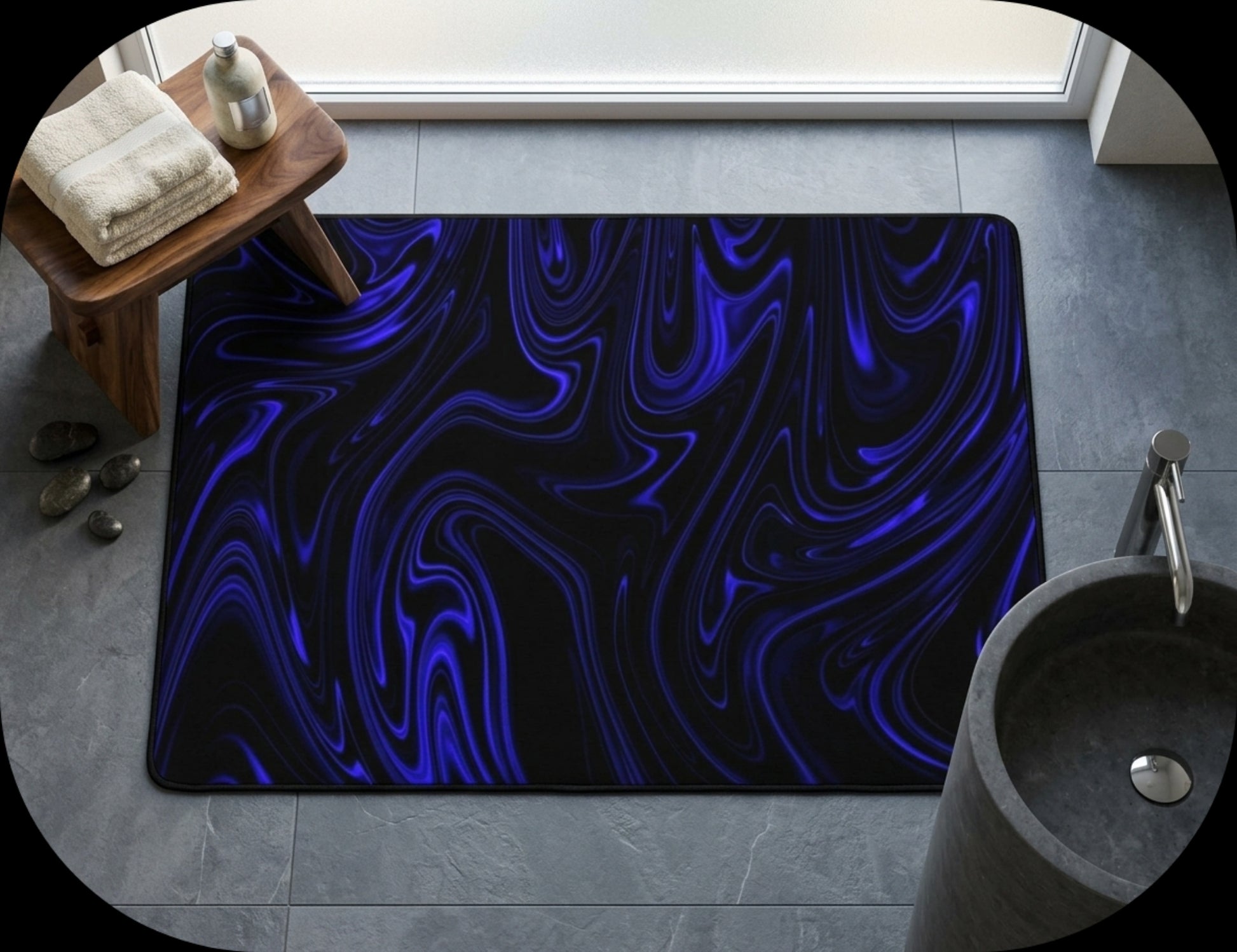 Direct overhead view of the Cobalt Heavenly Depths bath mat in a spa-style bathroom, positioned between a step stool and a modern concrete sink.
