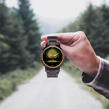 Yahuah: Tree of Life (03) automatic watch collection in black stainless steel, held by a hand in front of a forest road.