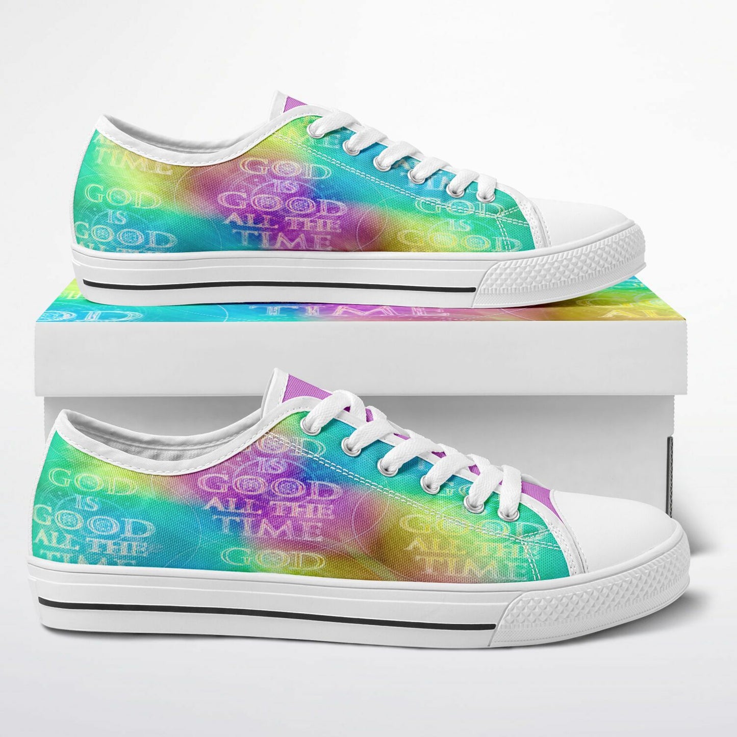 Colorful sneakers with 'God is Good All the Time' text on a white background