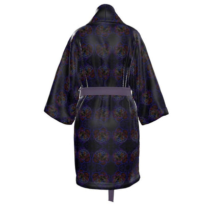 Studio back view of the Nocturnal Sanctuary kimono robe, highlighting the continuous floral motif and high-shine silk satin finish on a white background.