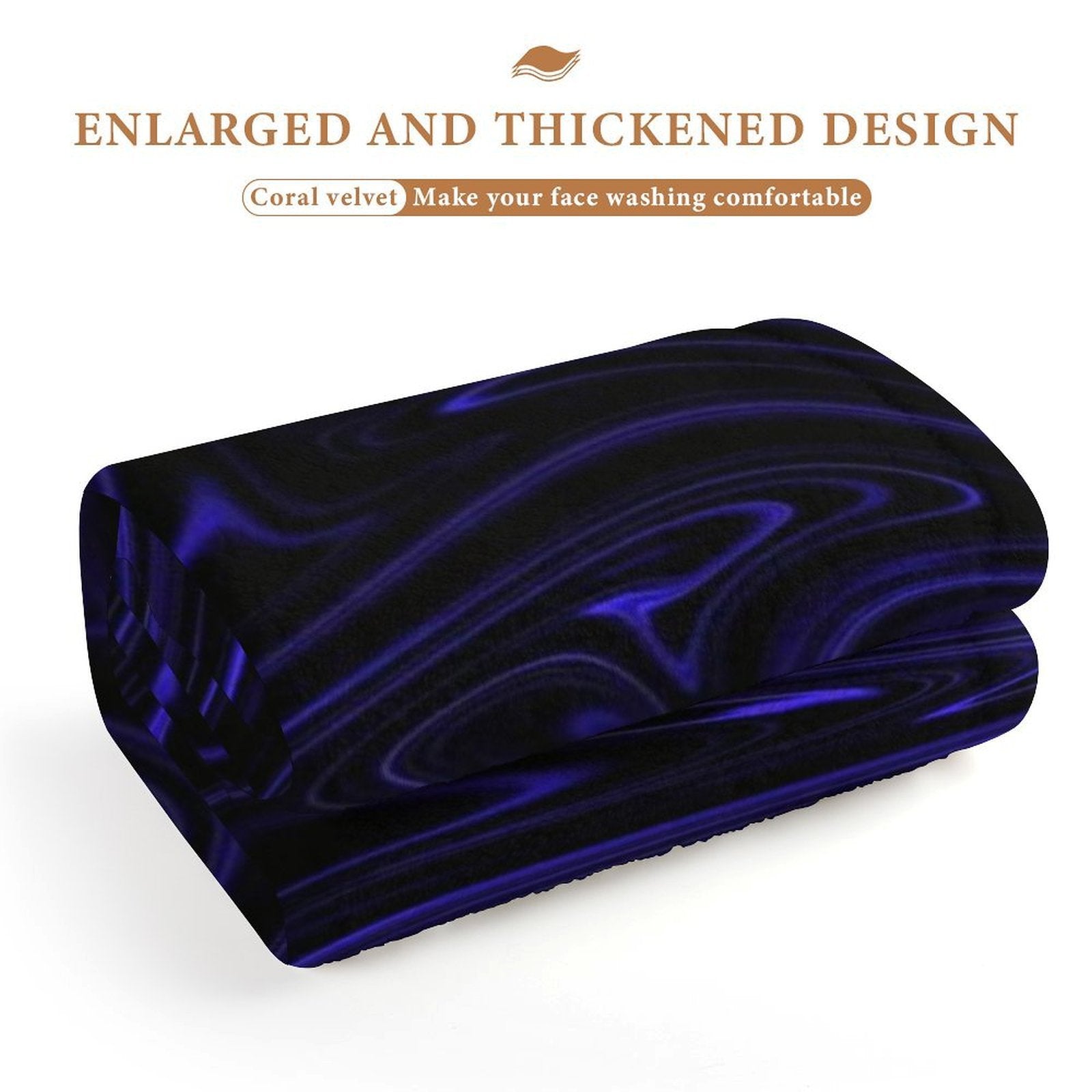 A rolled coral fleece towel demonstrating the enlarged and thickened design with the Cobalt Heavenly Depths liquid swirl pattern.