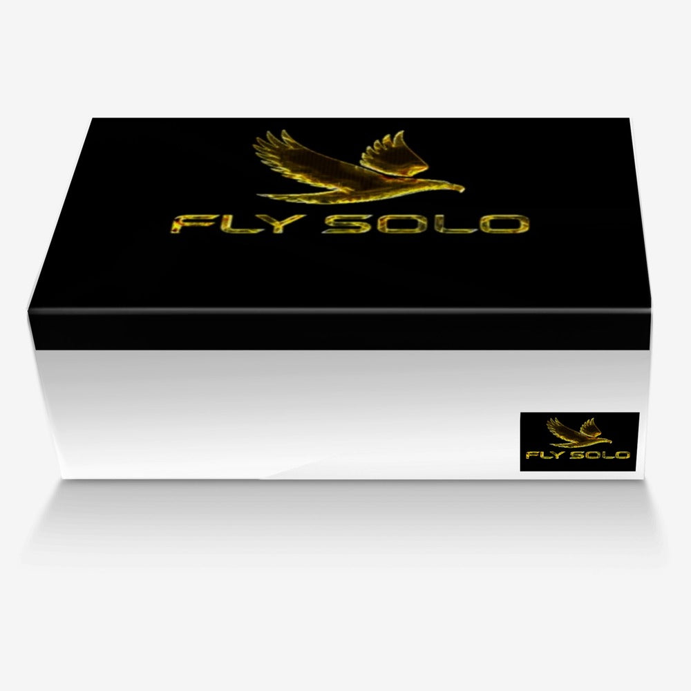 Front view of the black Fly Solo shoe box featuring a golden eagle in flight and bold "FLY SOLO" typography.