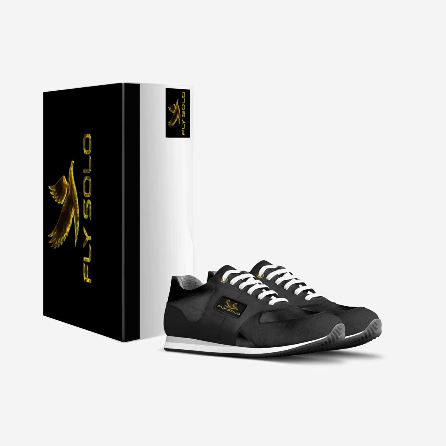 A pair of black and white men’s Fly Solo walking sneakers next to their custom black and gold designer shoe box.