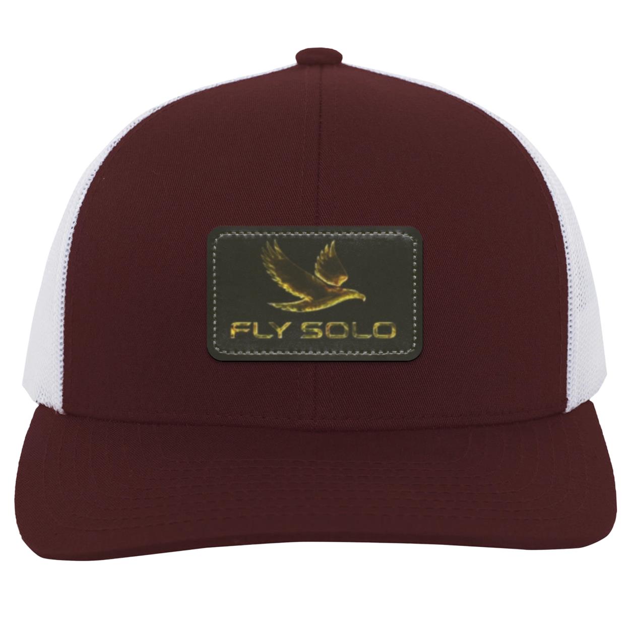 Front product shot of the maroon trucker hat with white mesh and the golden "Fly Solo" eagle emblem.