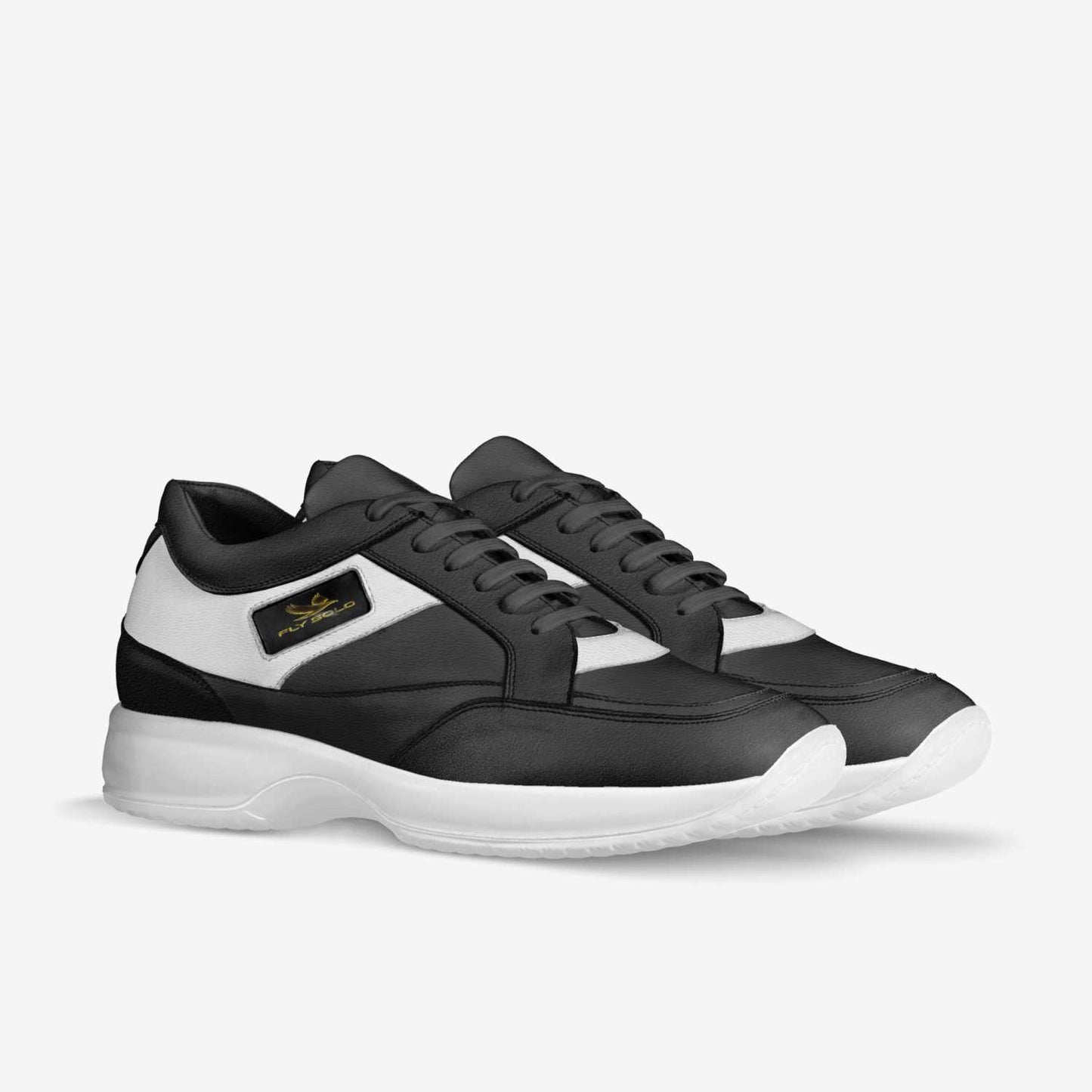 A three-quarter perspective view of a pair of Fly Solo walking sneakers highlighting the black laces and white accents.