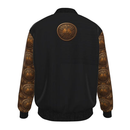 Studio product shot of the I AM HEBREW denim bomber jacket back, showcasing the intricate bronze medallion print on the sleeves and the central back crest.