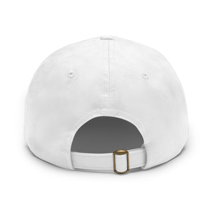 A rear view of the plain white dad hat from the collection, showing the back opening and the adjustable fabric strap with a brass buckle on a white background.