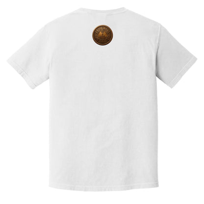 Back view of an ivory heavyweight t-shirt with a small, central "I AM" bronze emblem placed below the rear collar.