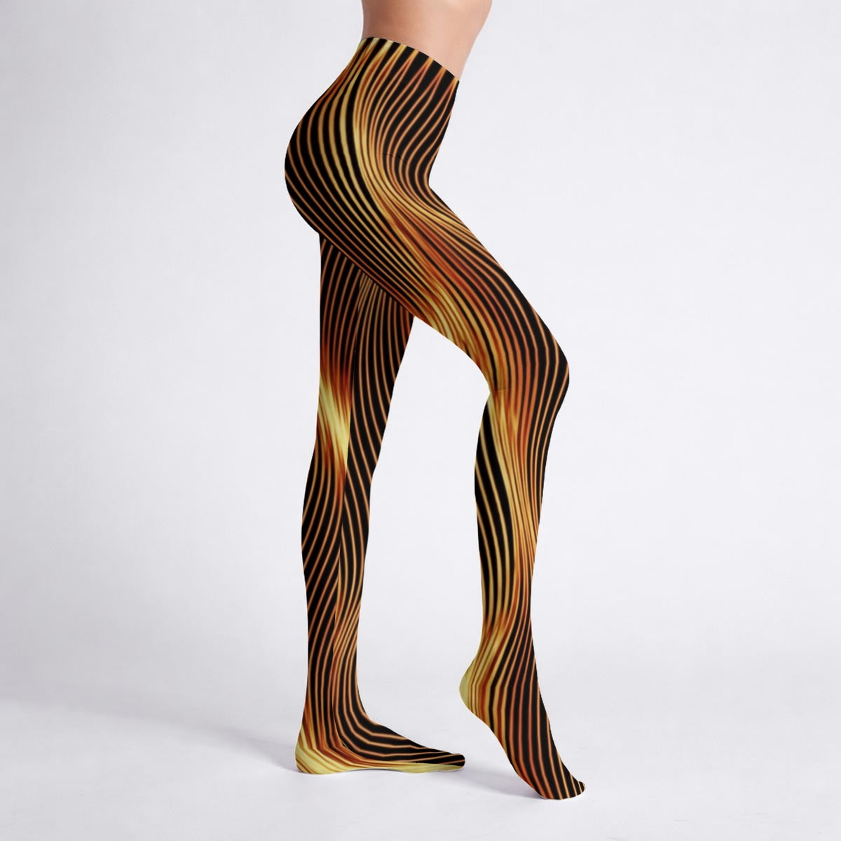 Side view of a model's legs posing in Esh Tamid high-stretch tights, showcasing the flowing orange and yellow light lines.