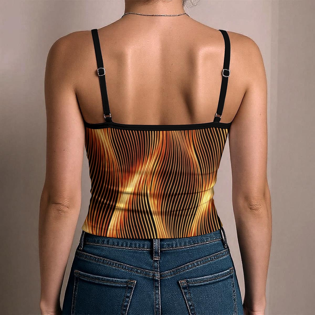 Studio back view of the Esh Tamid tank top, showing the straight neckline, black adjustable spaghetti straps, and continuous flame pattern.