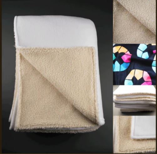 Material close-up of the premium throw blanket showing its soft beige sherpa fleece lining, detailed texture, and folded edges.