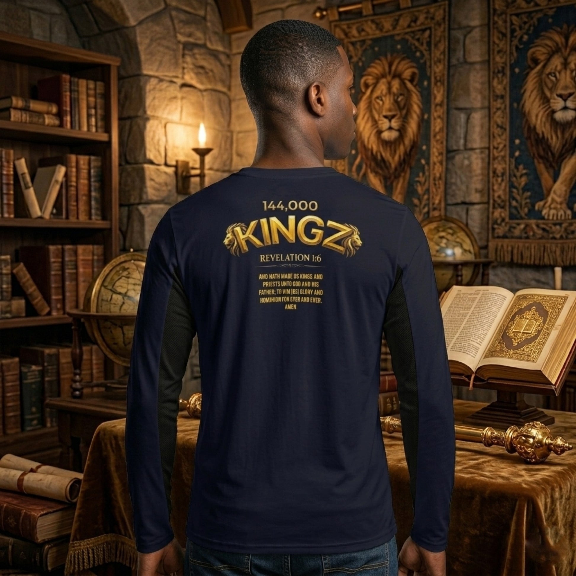 The back of a navy long-sleeve shirt displaying the "144,000 KINGZ" logo and Revelation 1:6 scripture in gold text, set against a scholarly study.