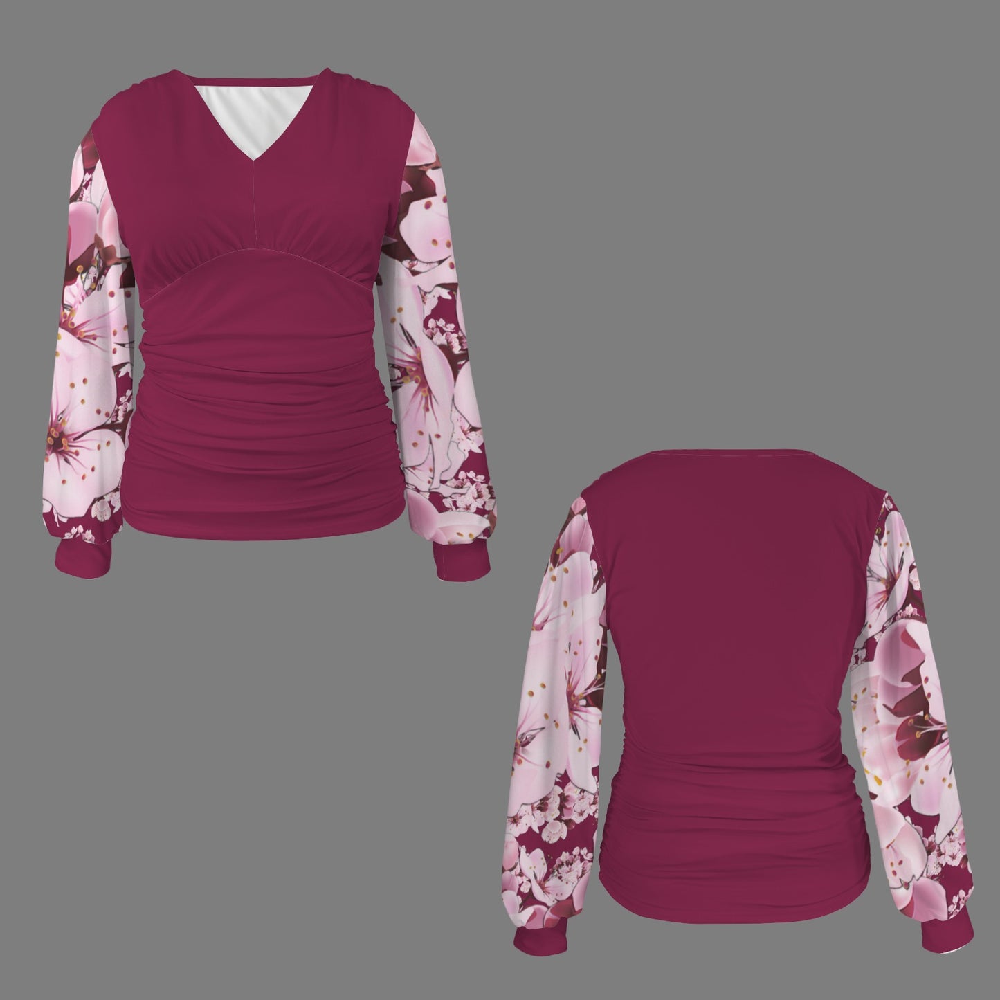 Front and back product display of the plum ruched V-neck blouse with pink floral sakura print contrast bishop sleeves on a gray background.