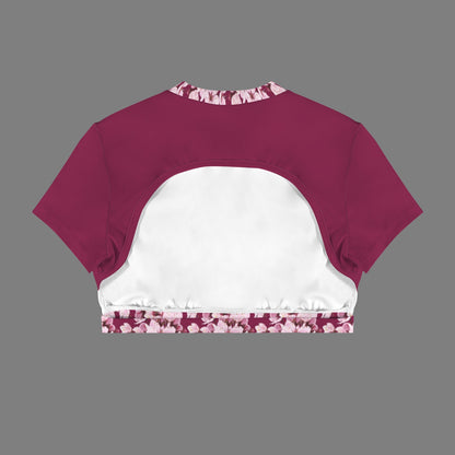 Product flat lay back view of the Sakura Symphony magenta crop top, displaying the dramatic crescent cutout and white inner lining.