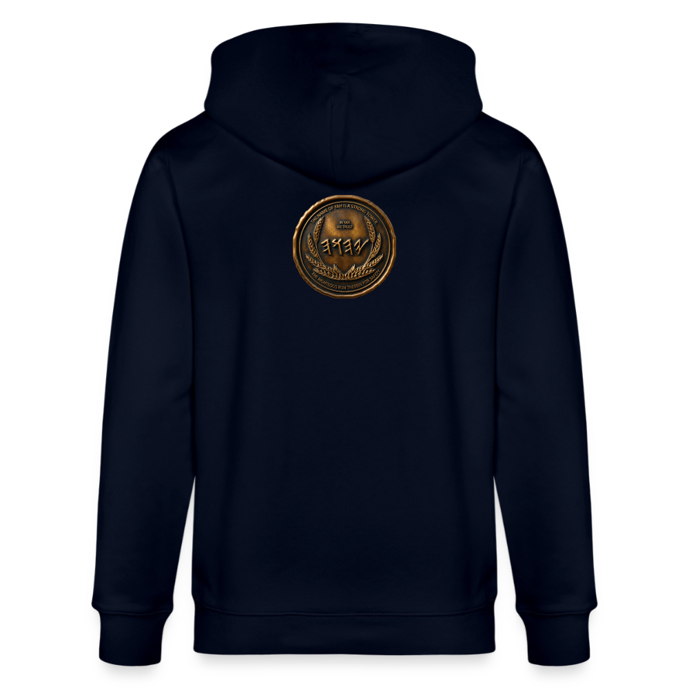 Back view of a navy blue organic zip hoodie featuring a large circular antiqued bronze medallion emblem centered on the upper back.