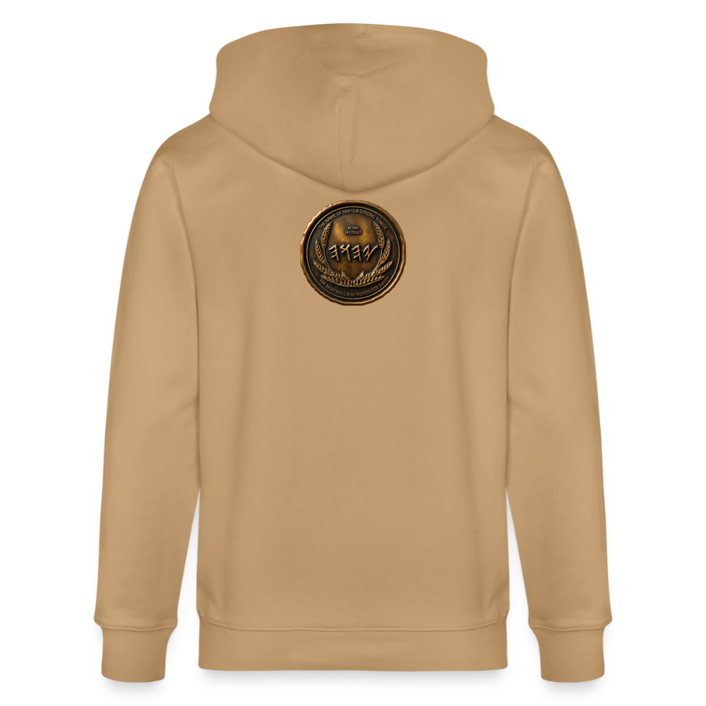 Back view of a tan organic zip hoodie featuring a large circular antiqued bronze medallion emblem centered on the upper back.