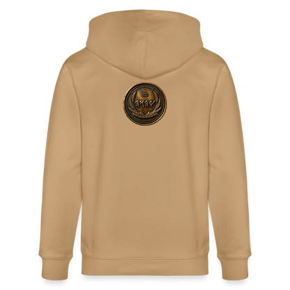Back view of a tan organic zip hoodie featuring a large circular antiqued bronze medallion emblem centered on the upper back.