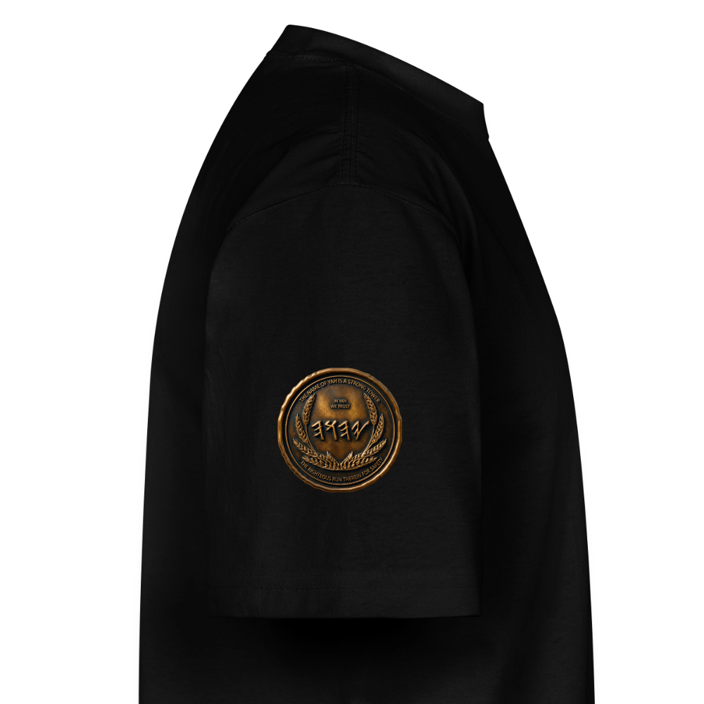Side profile showing the left sleeve of a black oversized heavyweight t-shirt detailed with a circular antiqued bronze symbolic emblem patch.