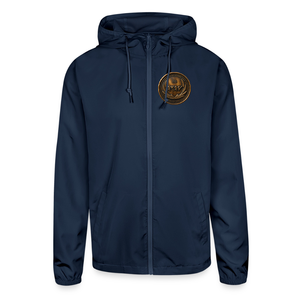Front view of a navy blue lightweight windbreaker featuring a circular antiqued bronze Paleo-Hebrew script emblem on the left chest.