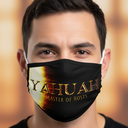Close-up of a man wearing the black custom-printed face mask with the golden typography design "YAHUAH Master of Hosts" on a blurred background.