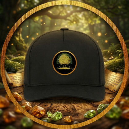 Gold Tree of Life "YAHUAH" emblem on a black perforated snapback cap, displayed on a wooden surface with ancient scrolls and glowing gems in a mystical forest.