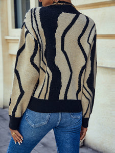 Suéter tipo jersey con estampado de patchwork y cuello redondo