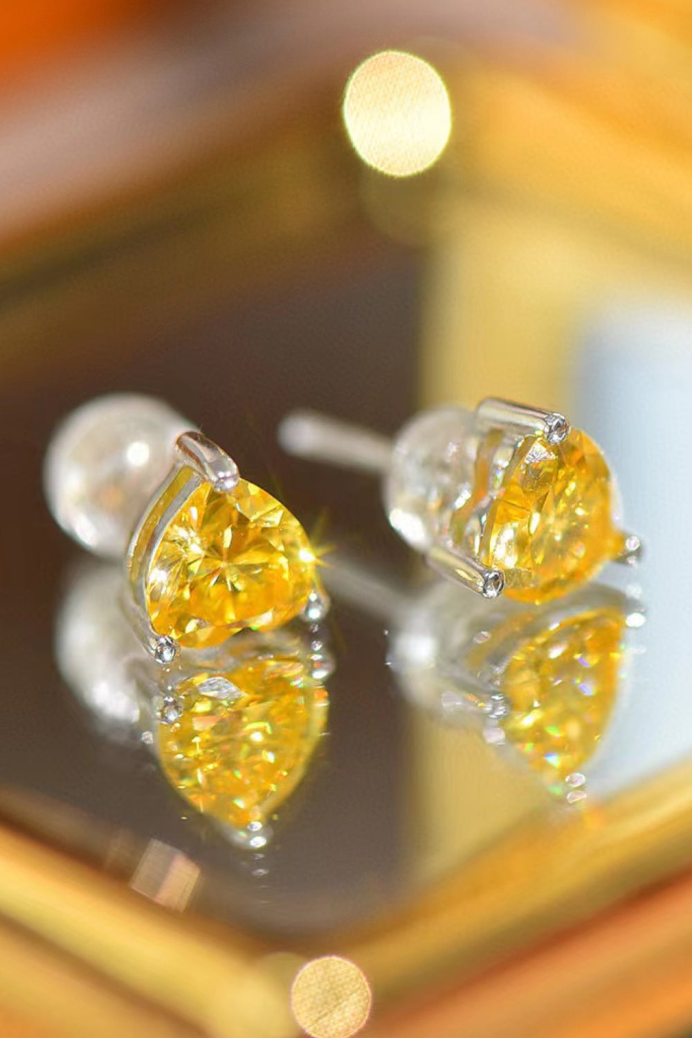 Yellow 2 Carat Heart Moissanite Platinum Plated Earrings