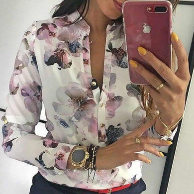 Blusa con botones de manga larga y estampado floral